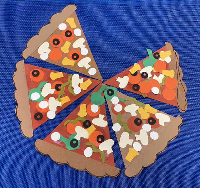 pizza slices with vegetables from cut paper
