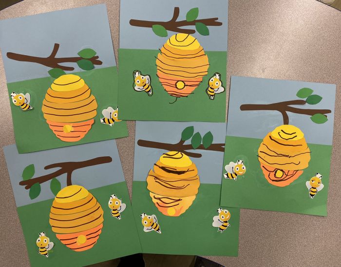 Beehive on a branch with bees kids art