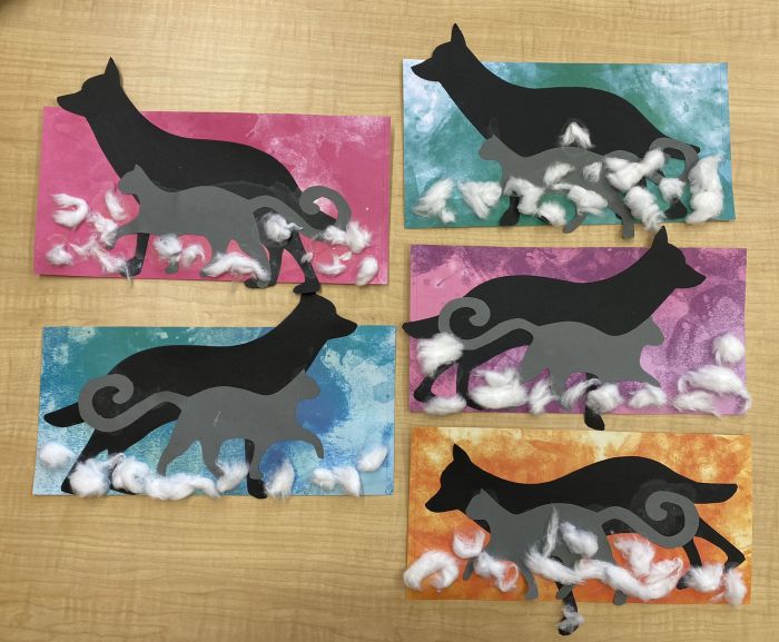 dog and cat in the snow from cut paper and cotton balls