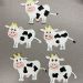 cows-from-cut-paper-white-pink-yellow thumbnail