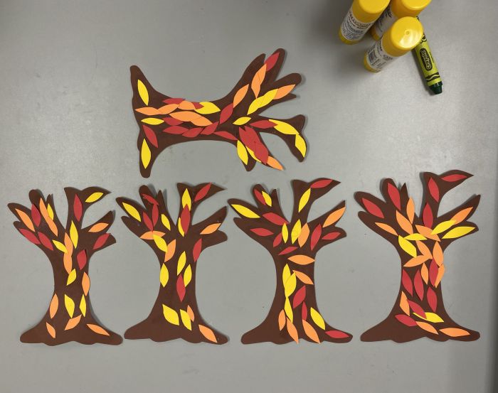 simple trees with autumn falling leaves from cut paper